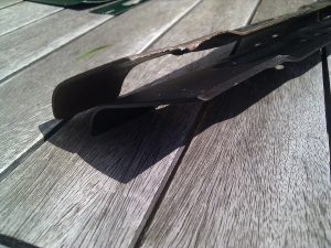 How to sharpen a lawnmower blade with a Dremel, step by step